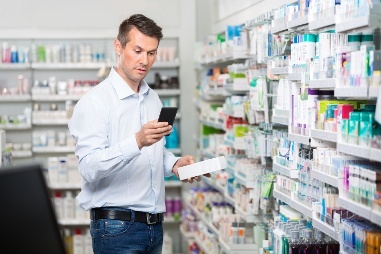 bigstock-Mid-adult-male-consumer-checki-99267218